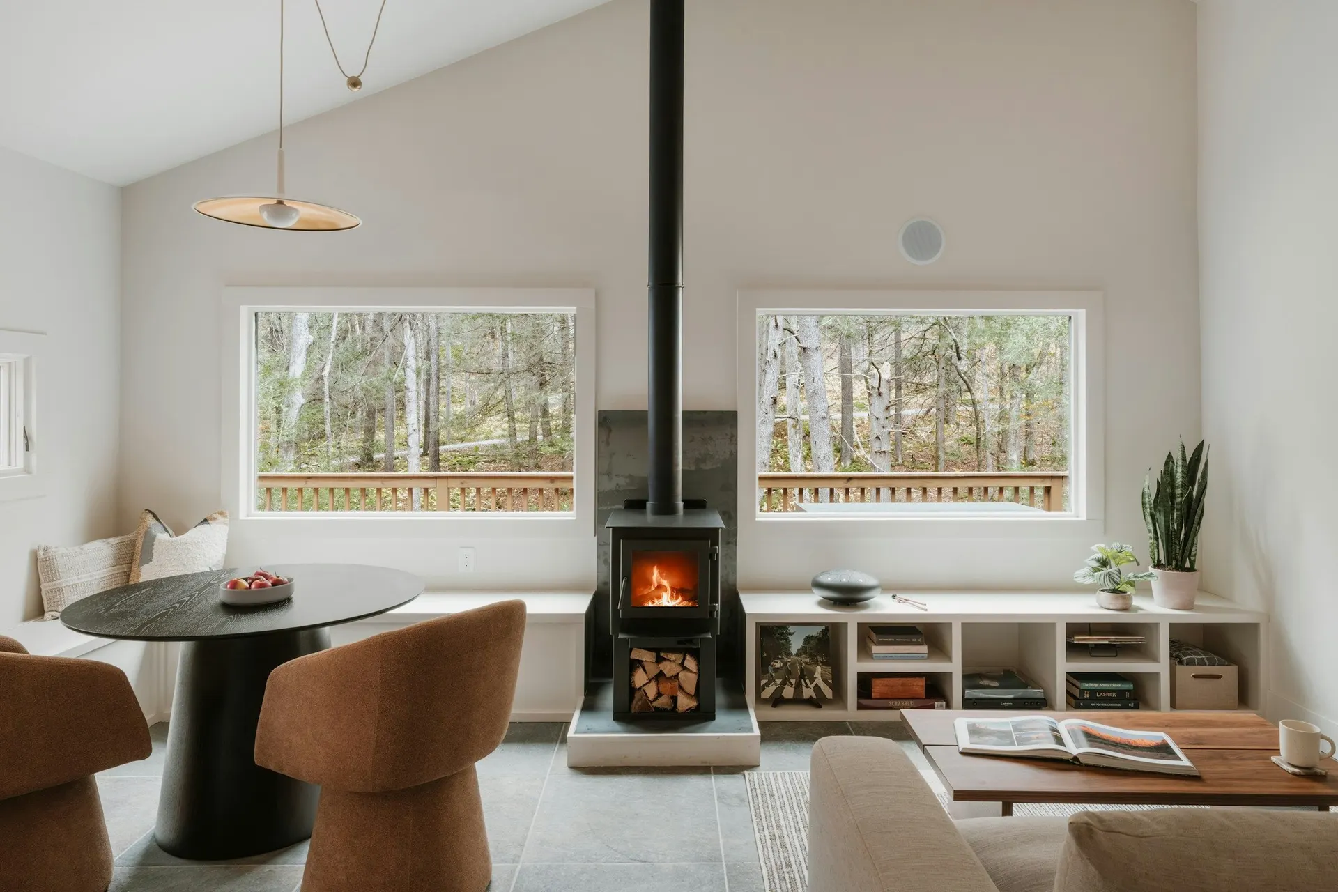 Cozy living room with fireplace and large windows